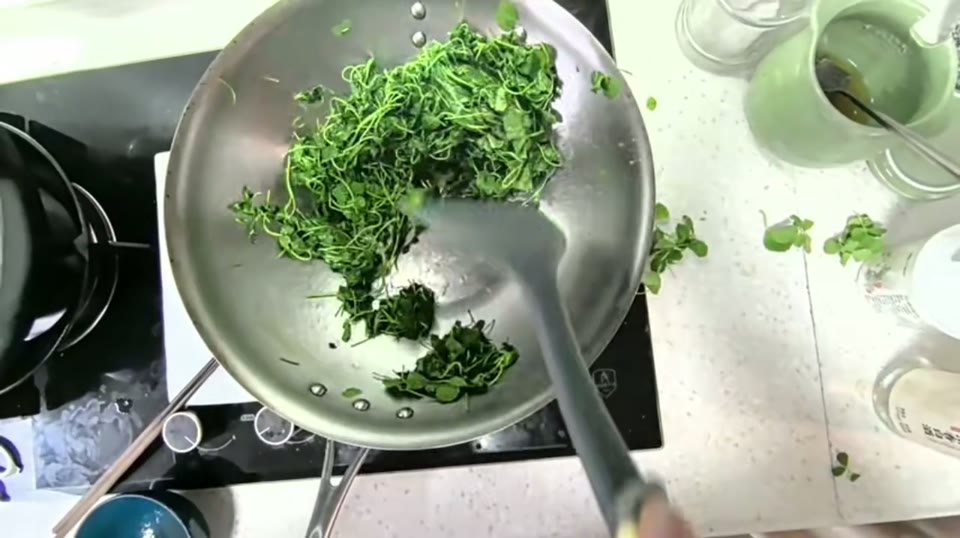 Stir-fried Alfalfa Sprouts with Chinese Baijiu in Spencer's kitchen